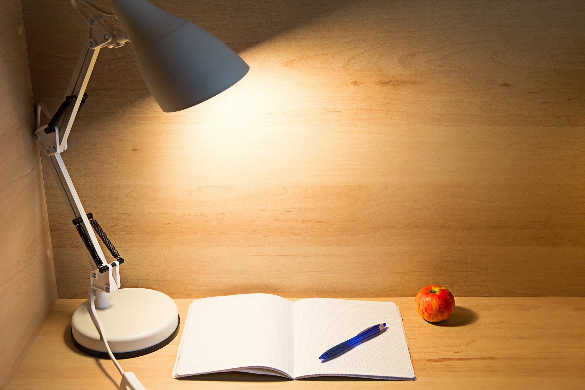 Table lamp in the loft style at the workplace at home