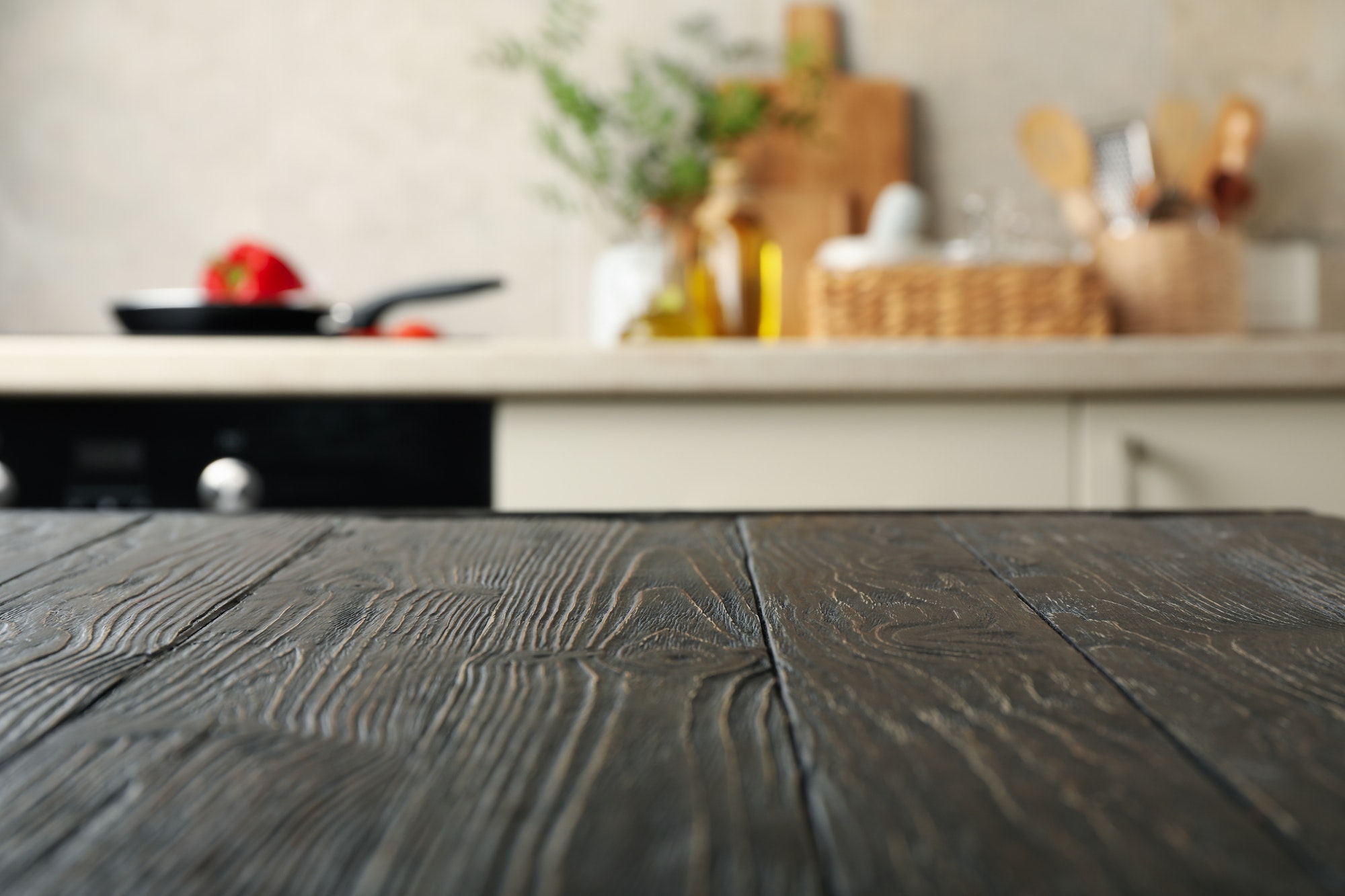 Wood table on blur kitchen room background